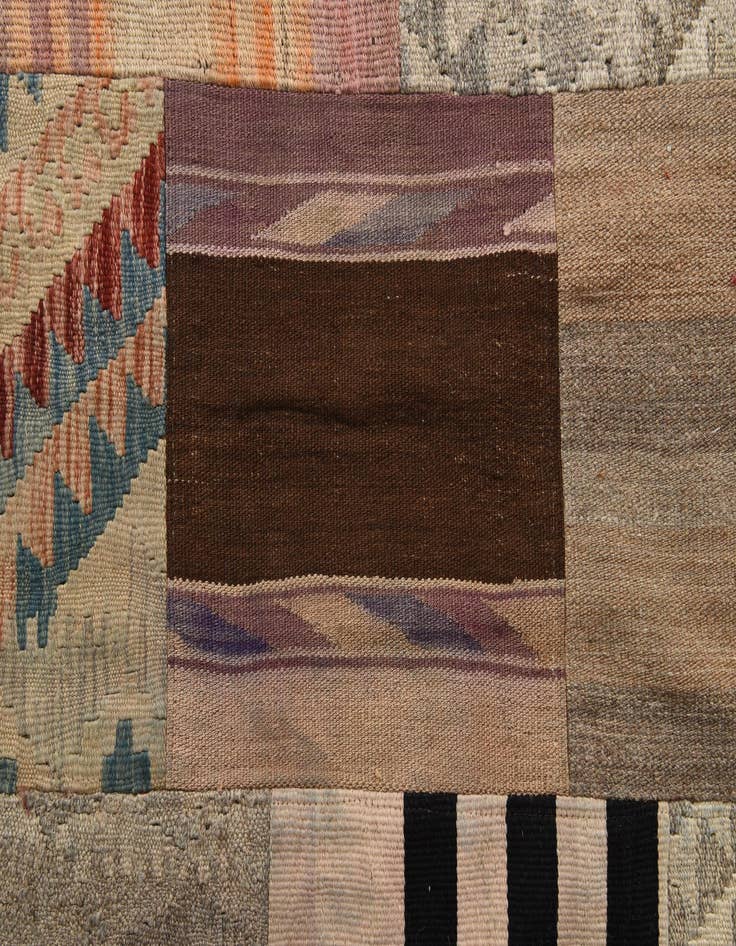 Detail image of  5' 6 x 8' 1  Hand Woven Kilim Patchwork Wool Rug
