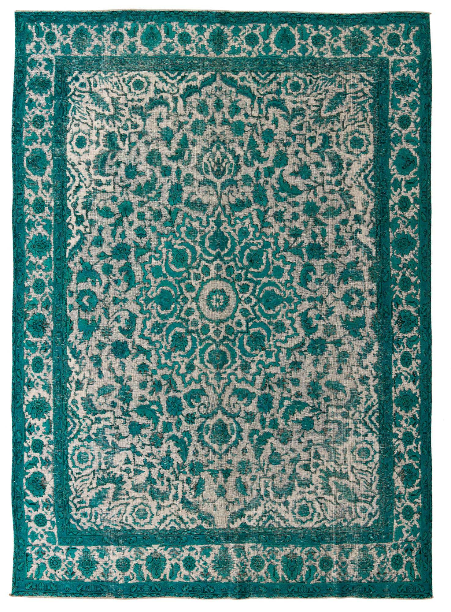 A 10x13 rectangular Persian rug with a faded teal and off-white medallion and floral pattern, featuring an ornate border.