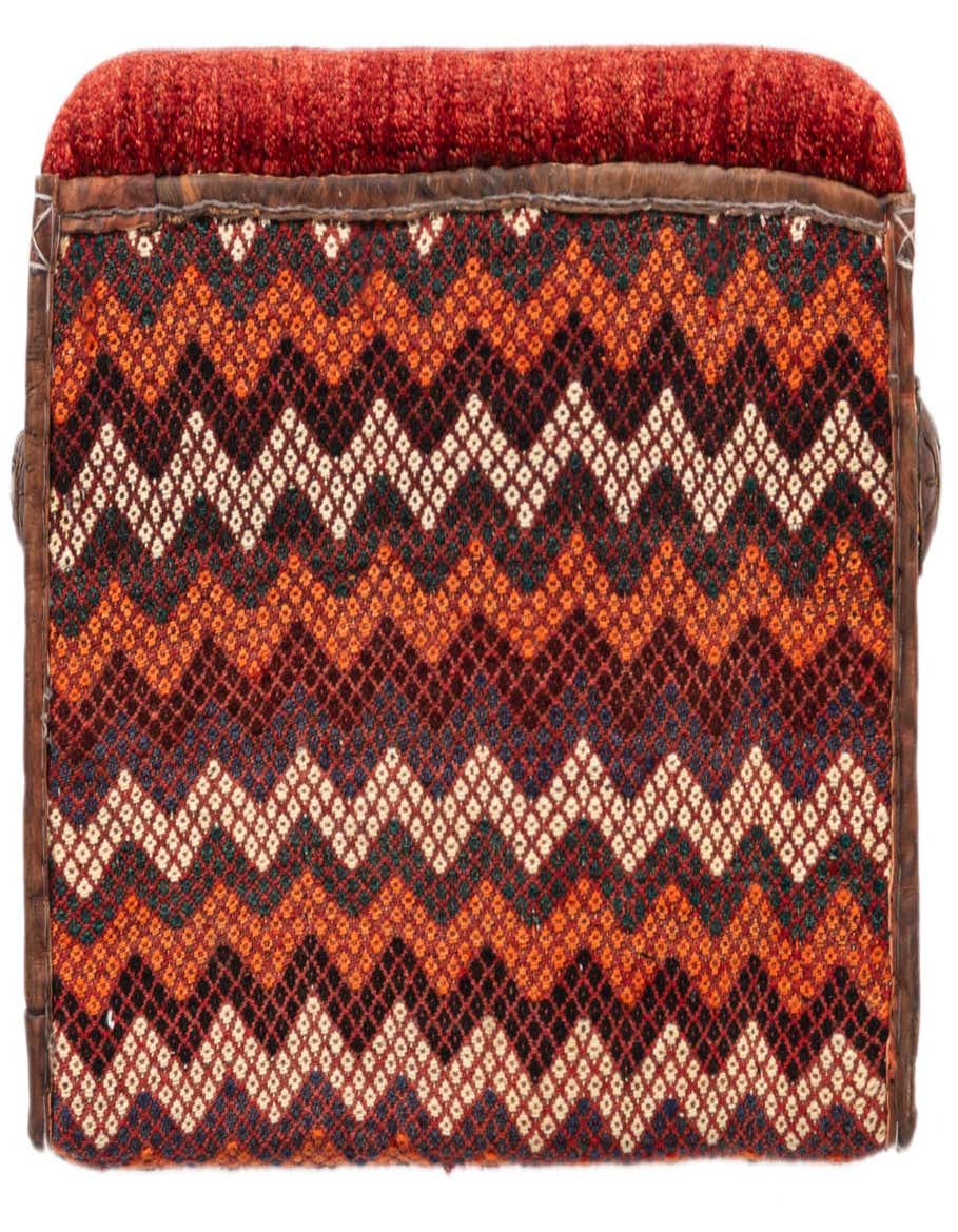 A rectangular 1x2 orange and red traditional rug with a textured zigzag pattern, featuring small diamond shapes.