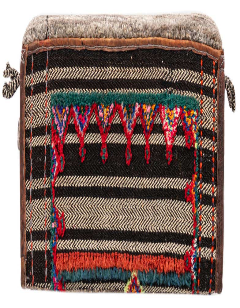 A rectangular 1x2 brown and tan textured rug with a traditional Oriental pattern, featuring colorful embroidered details.