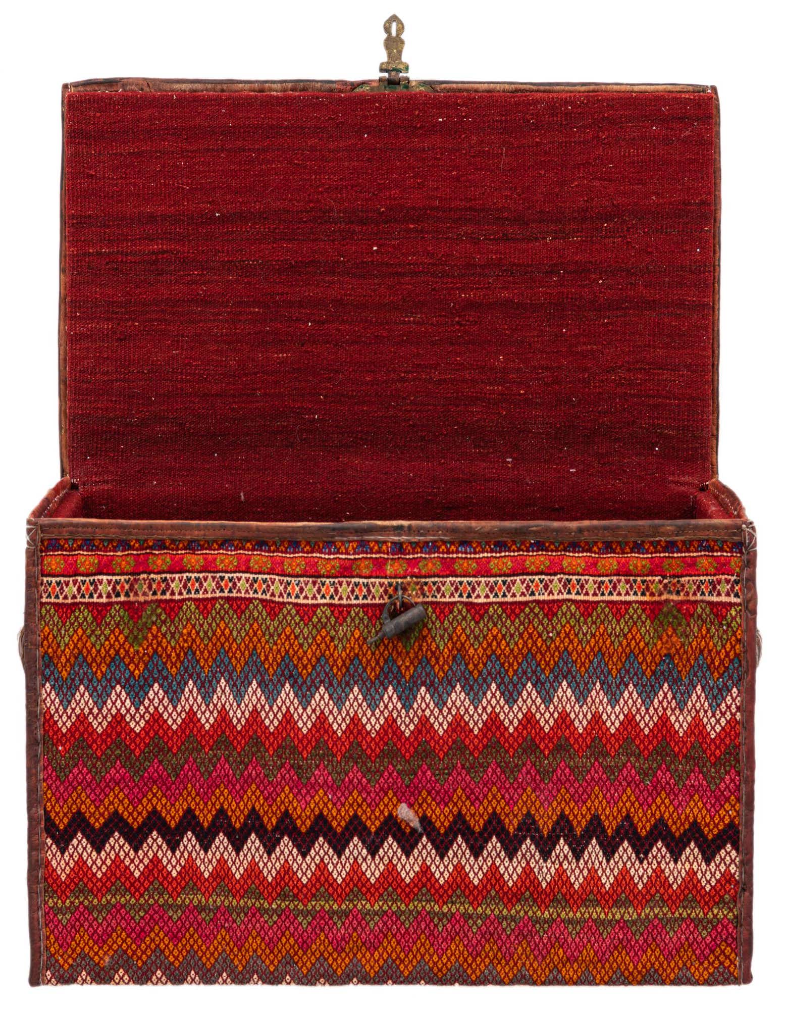 An open rectangular storage chest with a vibrant, multicolored zigzag pattern on the exterior and a solid red interior.