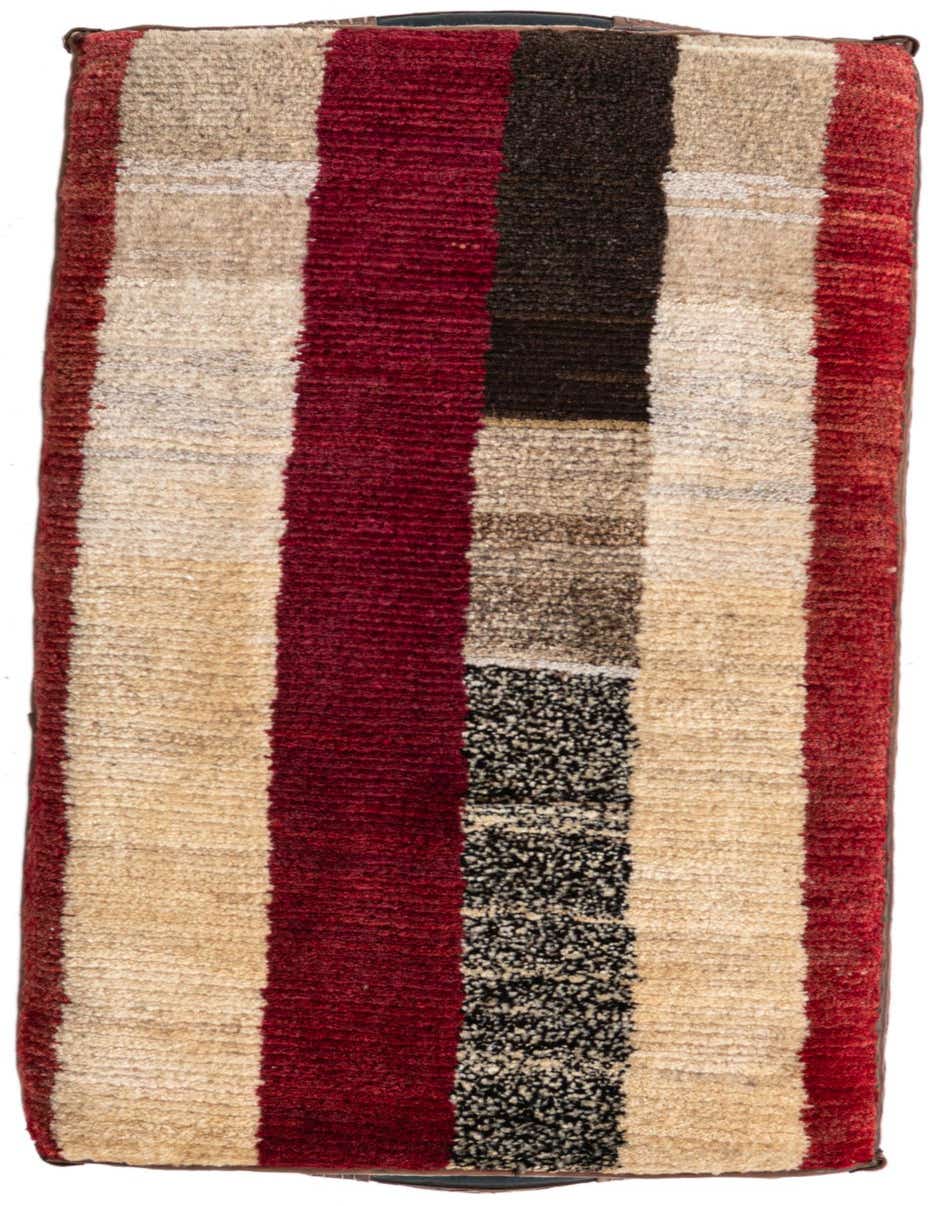 A rectangular 2x3 multi-colored rug with bold stripes in red, beige, and black, featuring a textured, medium pile.