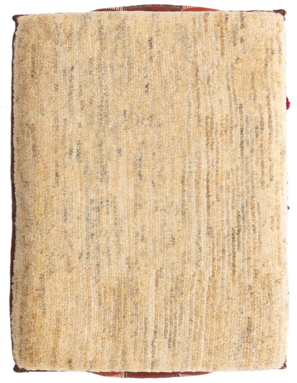 A 2x3 rectangular ivory and cream rug with a subtle textured stripe pattern, showcasing its soft, handmade pile.