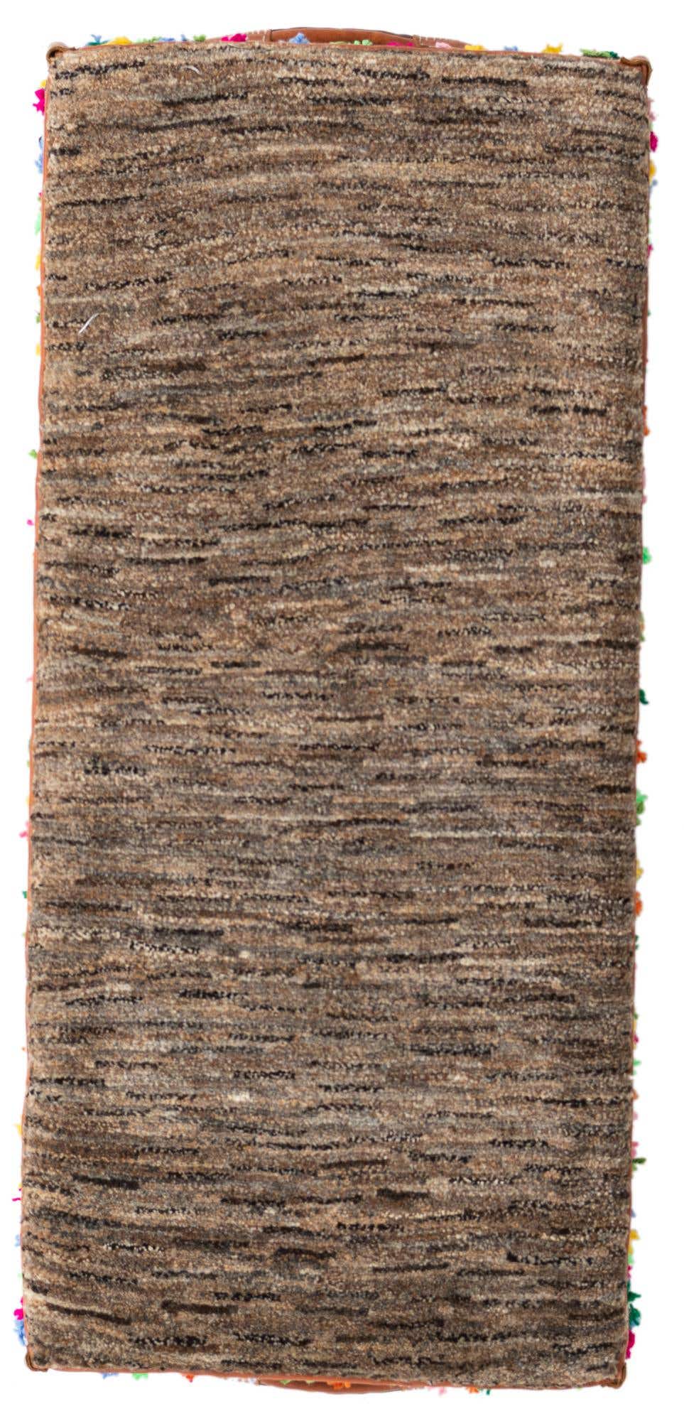 A 2x3 rectangular brown and tan modern abstract rug with a medium pile, featuring subtle horizontal stripes and colorful tassels on the short edges.