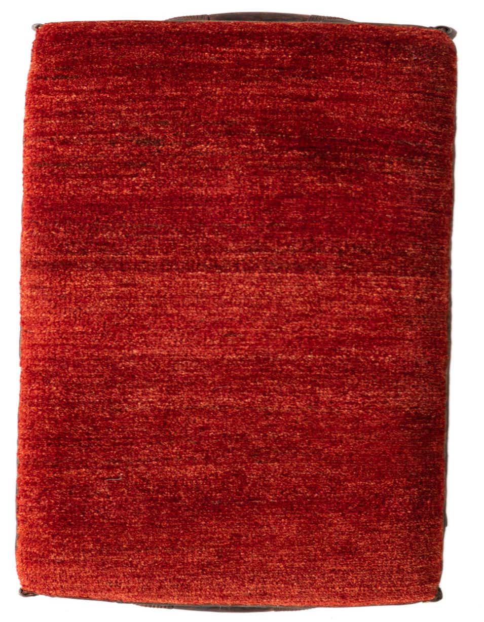 A 2x3 rectangular modern rug in shades of orange and red with a medium pile, perfect for a kitchen.