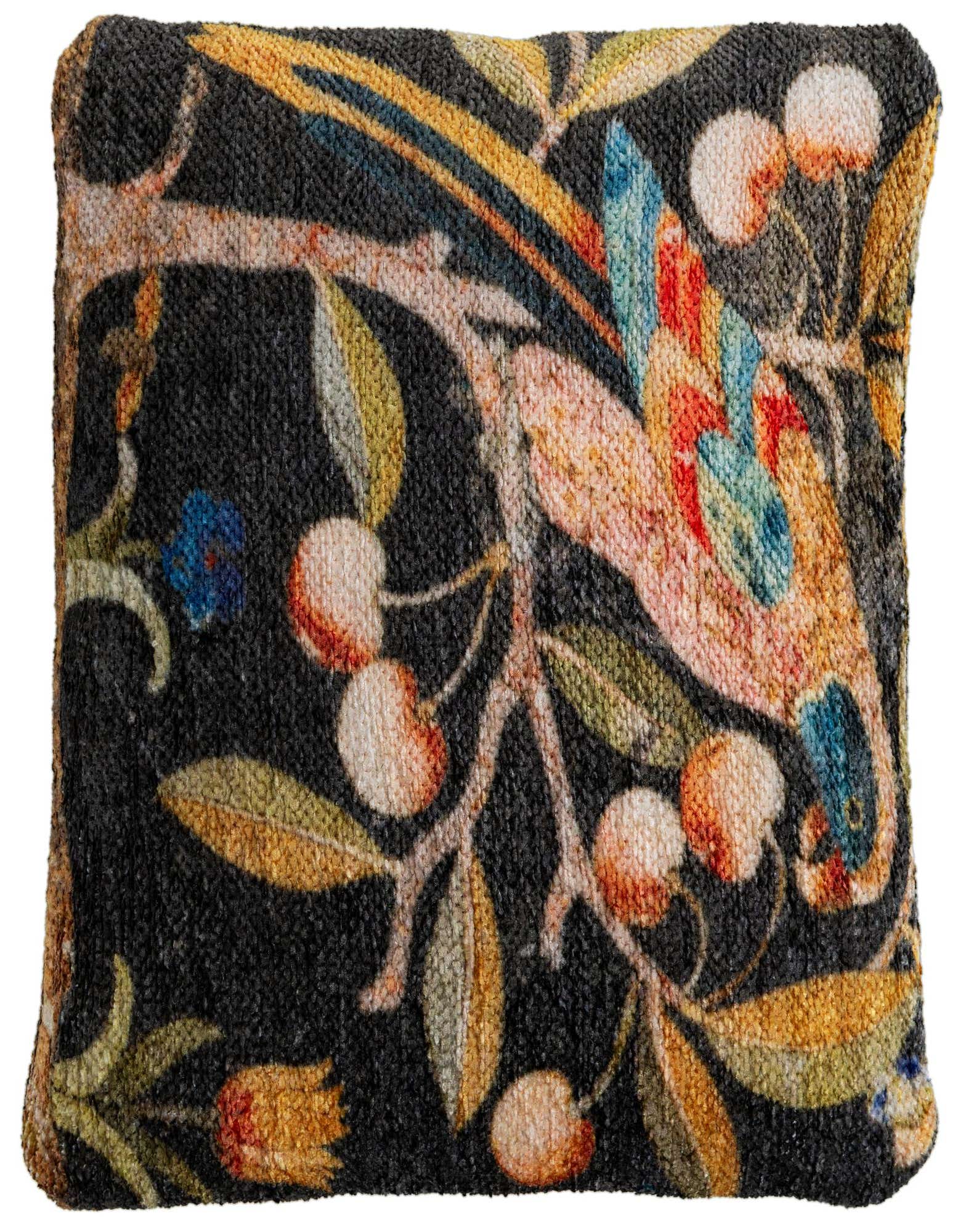 A rectangular multi-colored pillow featuring a vibrant floral and botanical pattern with a bird.