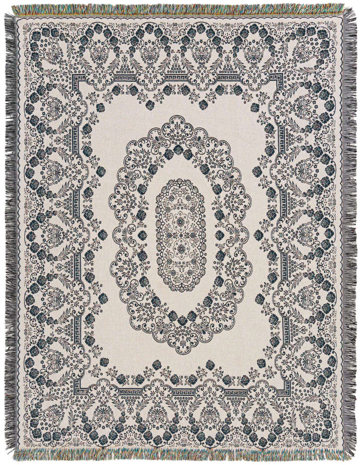 A 4x6 rectangular ivory cotton rug with a traditional oriental medallion pattern in dark blue and grey, featuring fringe.