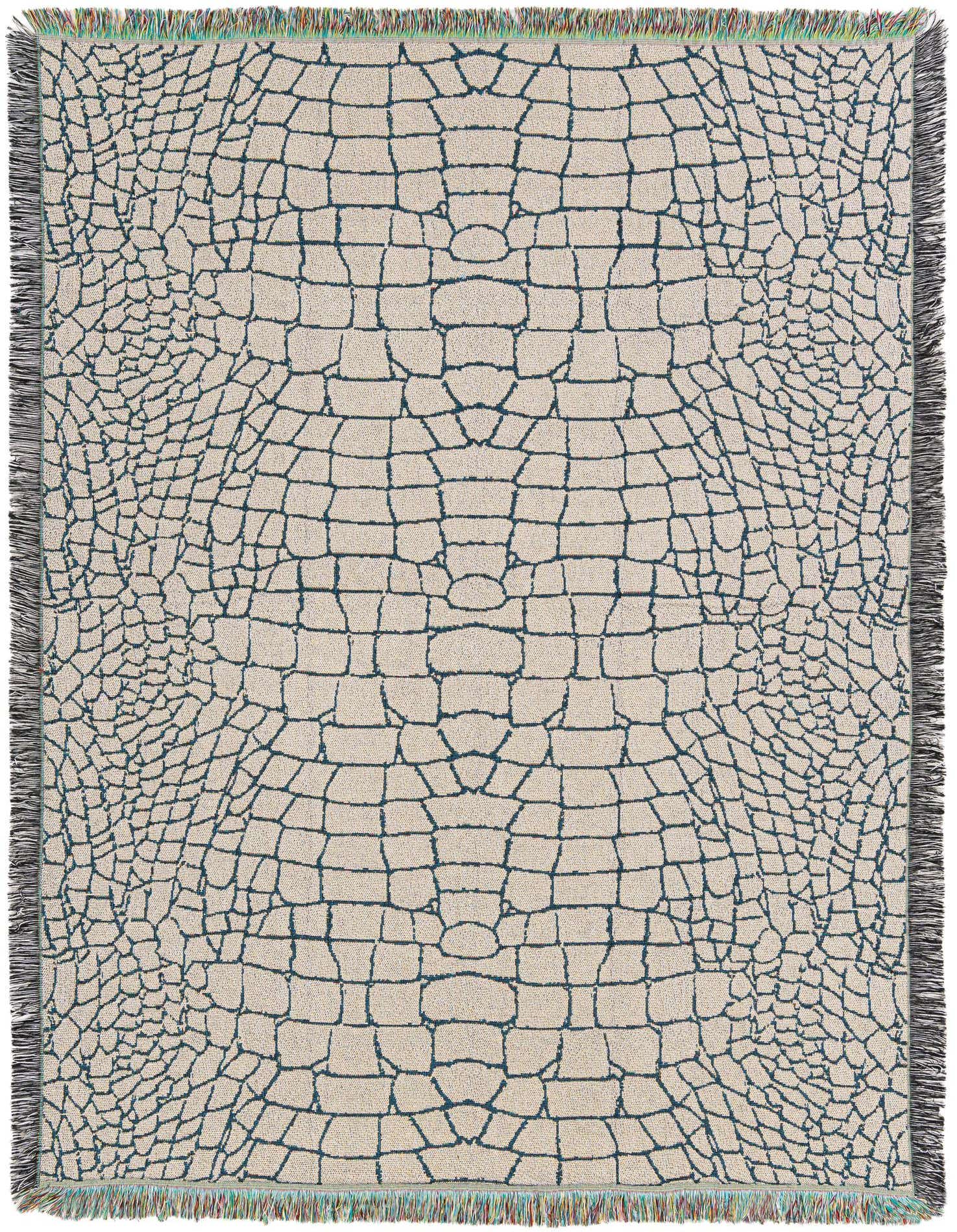 A 4x6 rectangular ivory and teal throw blanket with a modern, abstract crocodile skin pattern and fringed edges.