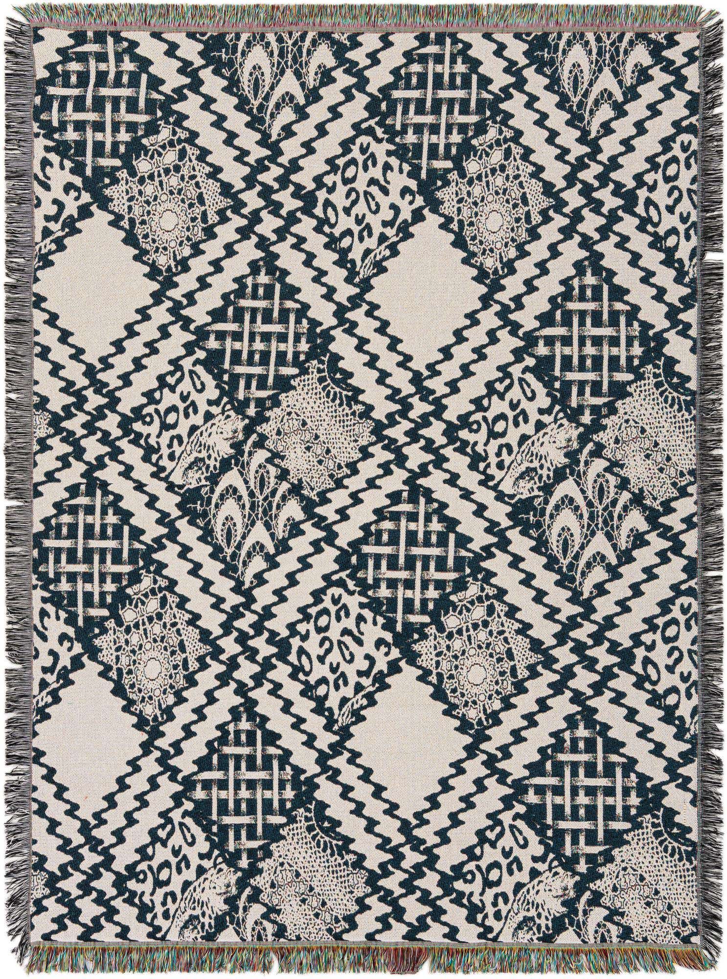 A 4x6 rectangular ivory and dark blue rug with a traditional, oriental pattern featuring geometric shapes and intricate lace-like motifs.