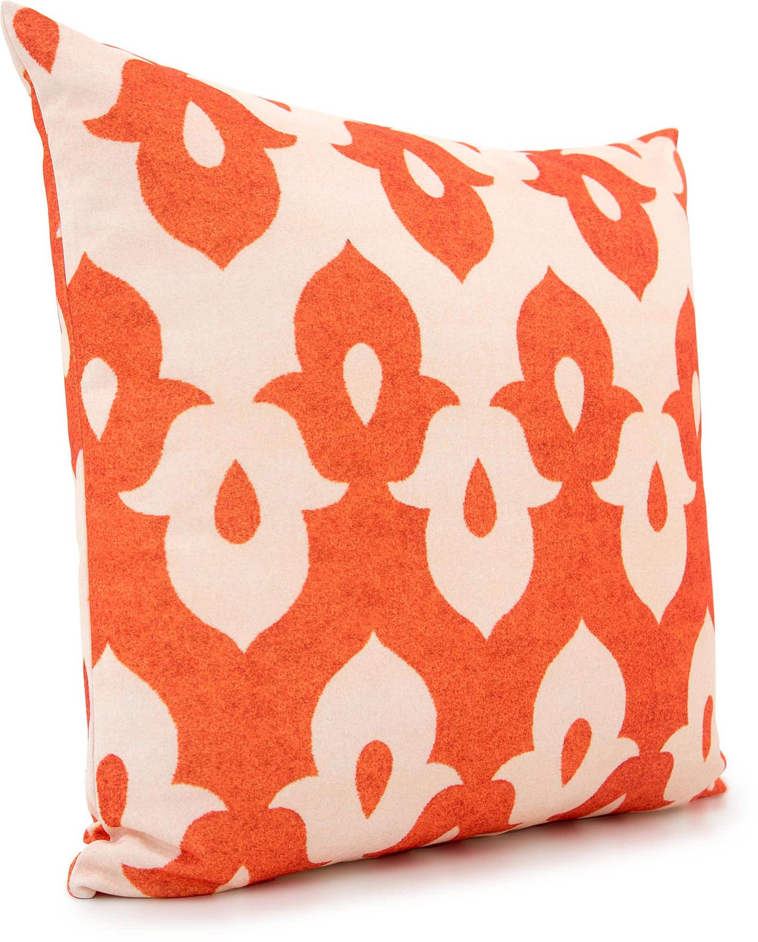 A rectangular orange and cream pillow with a modern ikat pattern, ideal for a patio or indoor space.
