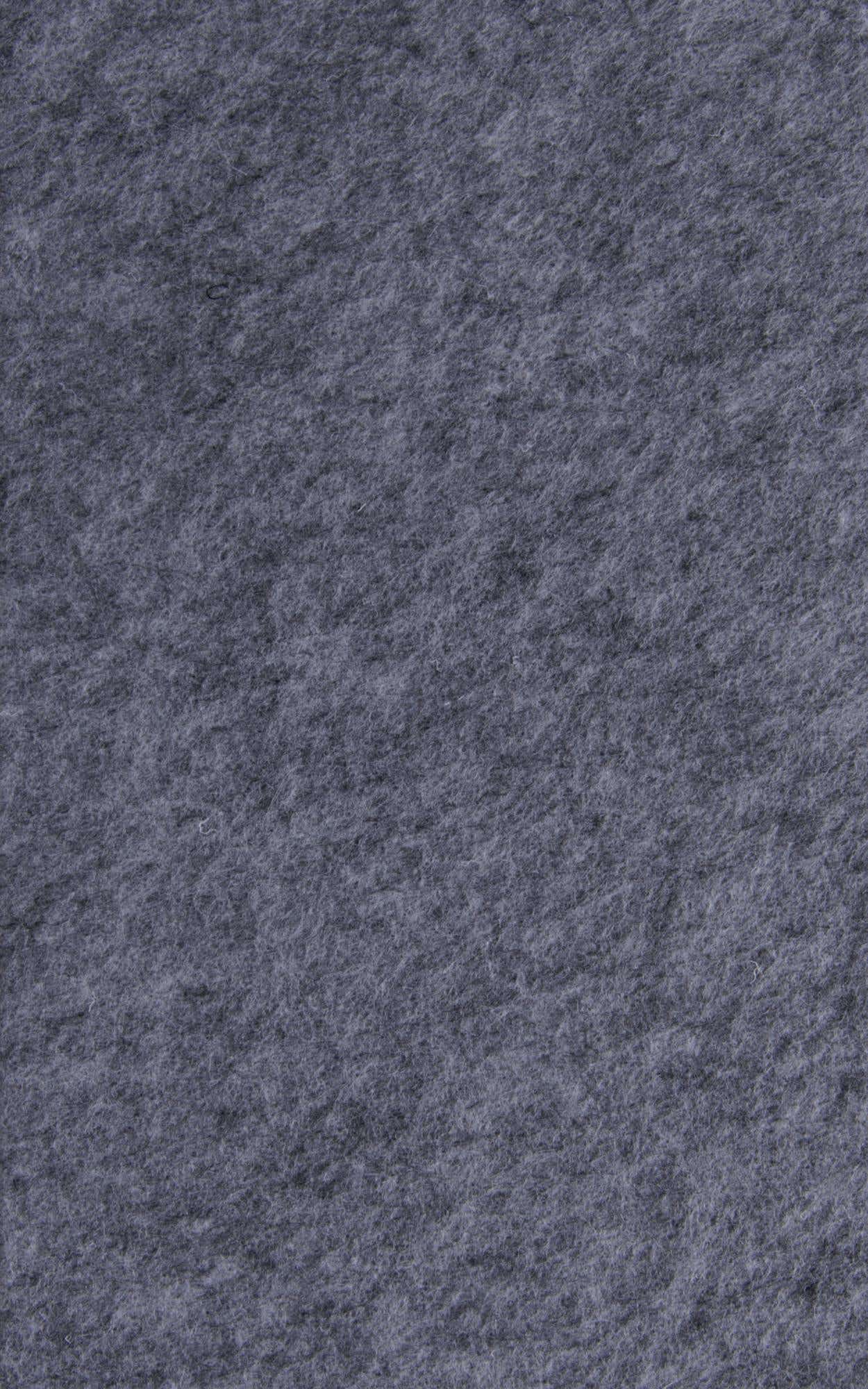 Close-up of a medium pile, rectangular 3x5 indoor rug in a solid dark gray color, suitable for a kitchen or entryway.