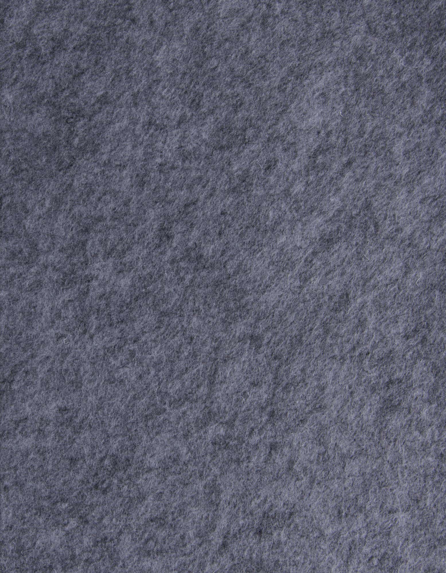 Close-up of a solid gray square rug with a medium pile texture, suitable for indoor use.