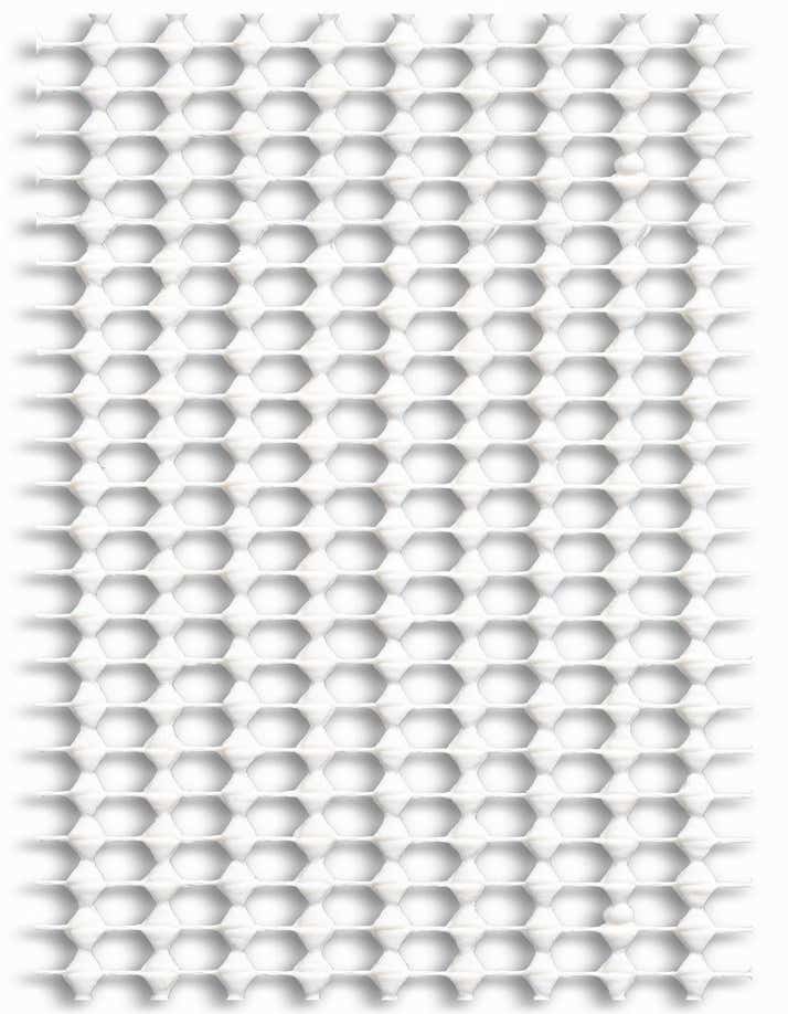 Close-up of a white non-slip rug pad featuring a hexagonal grid pattern, providing cushioning and grip.