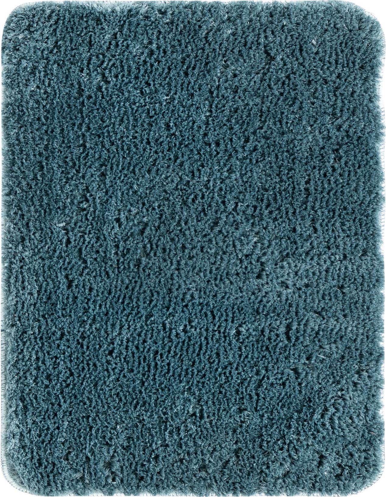 A soft, plush 2x3 rectangular shag bath mat in a deep blue color, perfect for a modern bathroom.