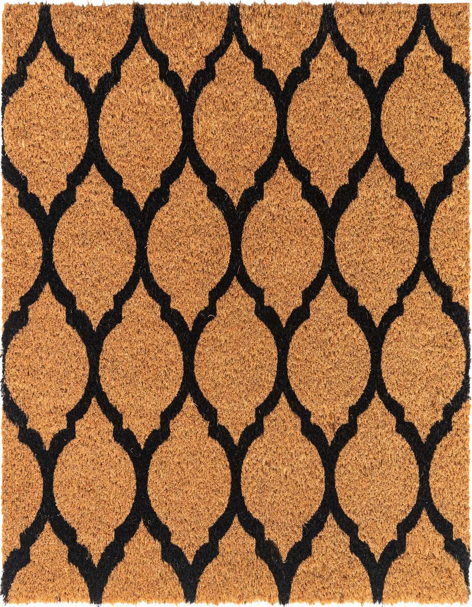 A rectangular brown coir doormat with a bold black quatrefoil pattern, ideal for an entryway.