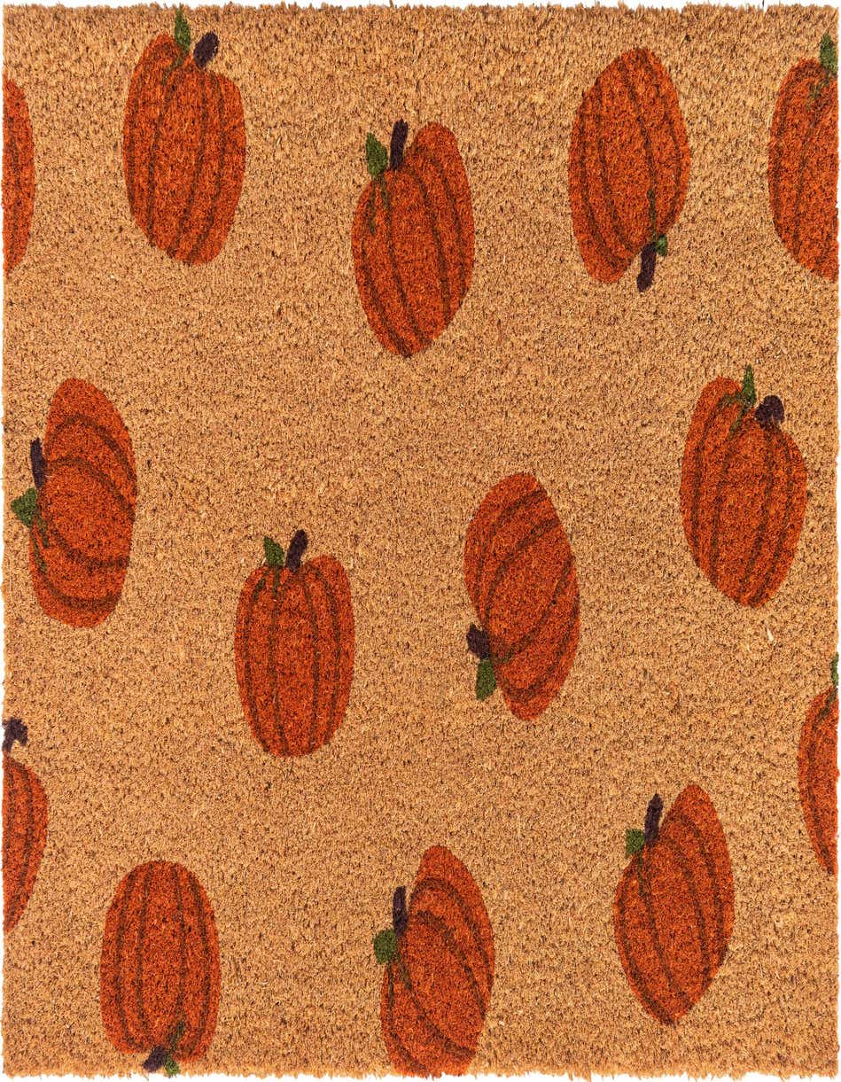 A rectangular brown coir doormat featuring a repeating pattern of orange pumpkins with green leaves and dark stems.