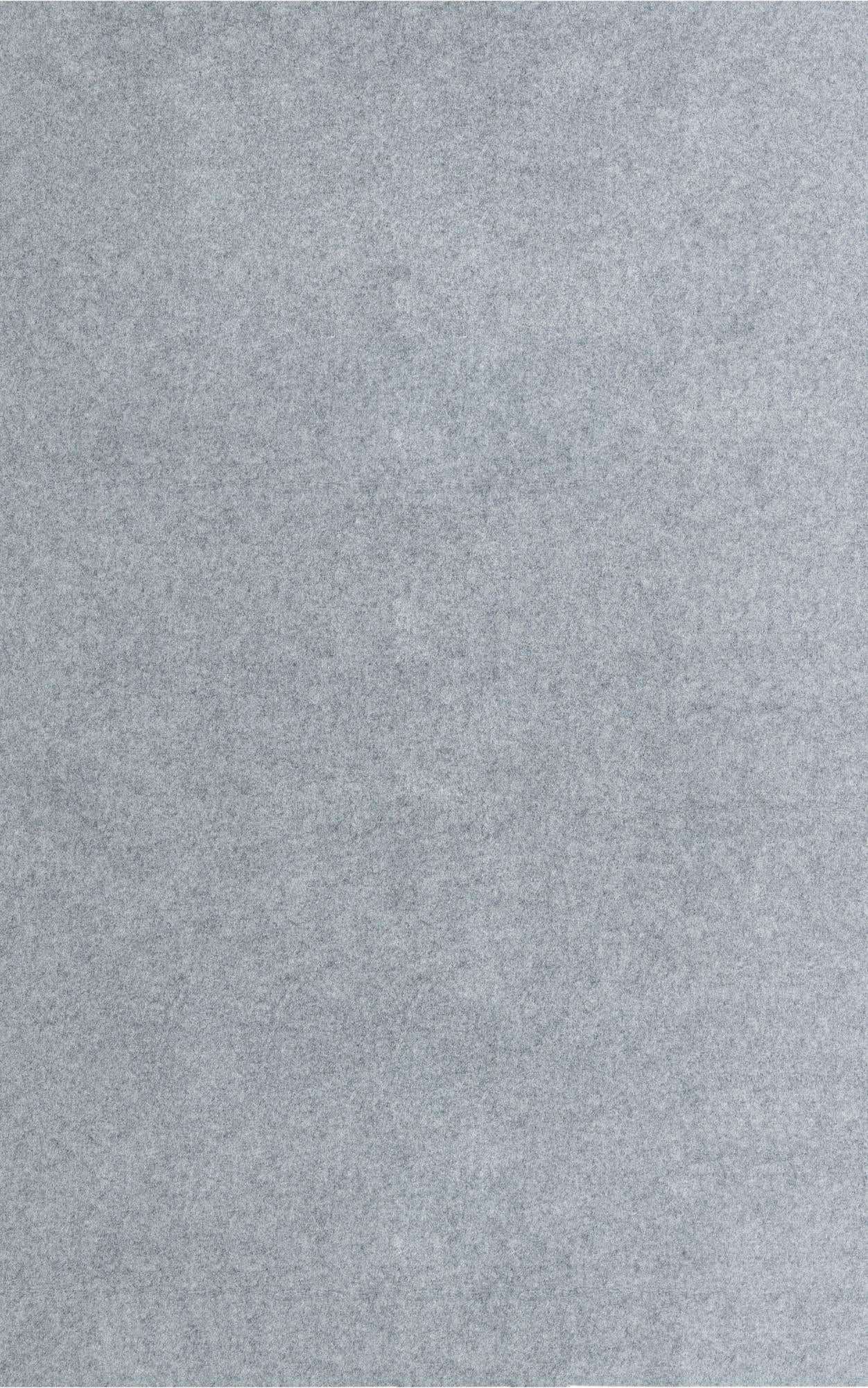 A close-up view of a 10x16 rectangular rug pad with a medium pile in a solid light gray color.
