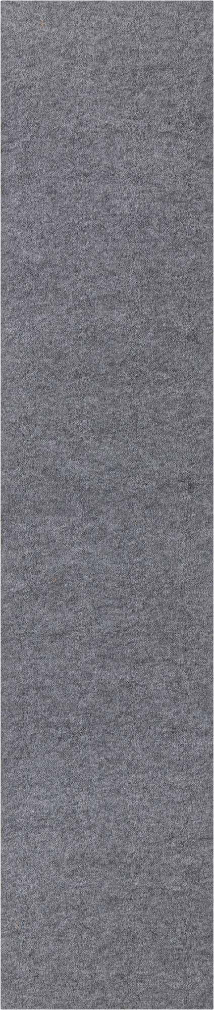 A close-up view of a medium gray 12 ft runner rug, showing its textured, low-pile surface suitable for a hallway or patio.