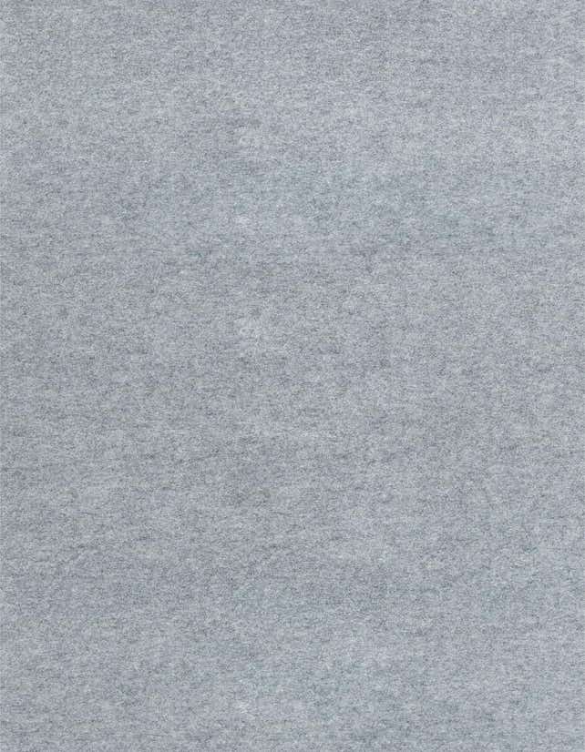 A close-up view of a medium pile, solid light gray runner rug, showcasing its soft texture.