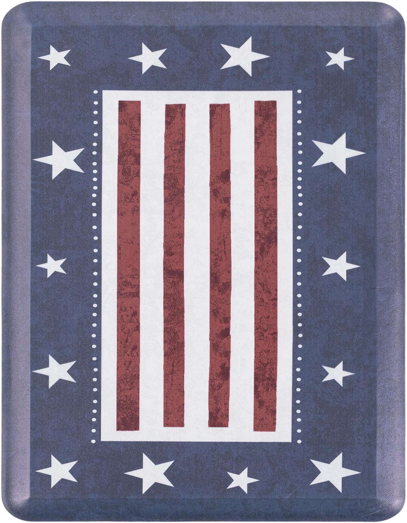 A rectangular 2x3 comfort mat featuring a patriotic design with red and white stripes framed by a blue border with white stars.