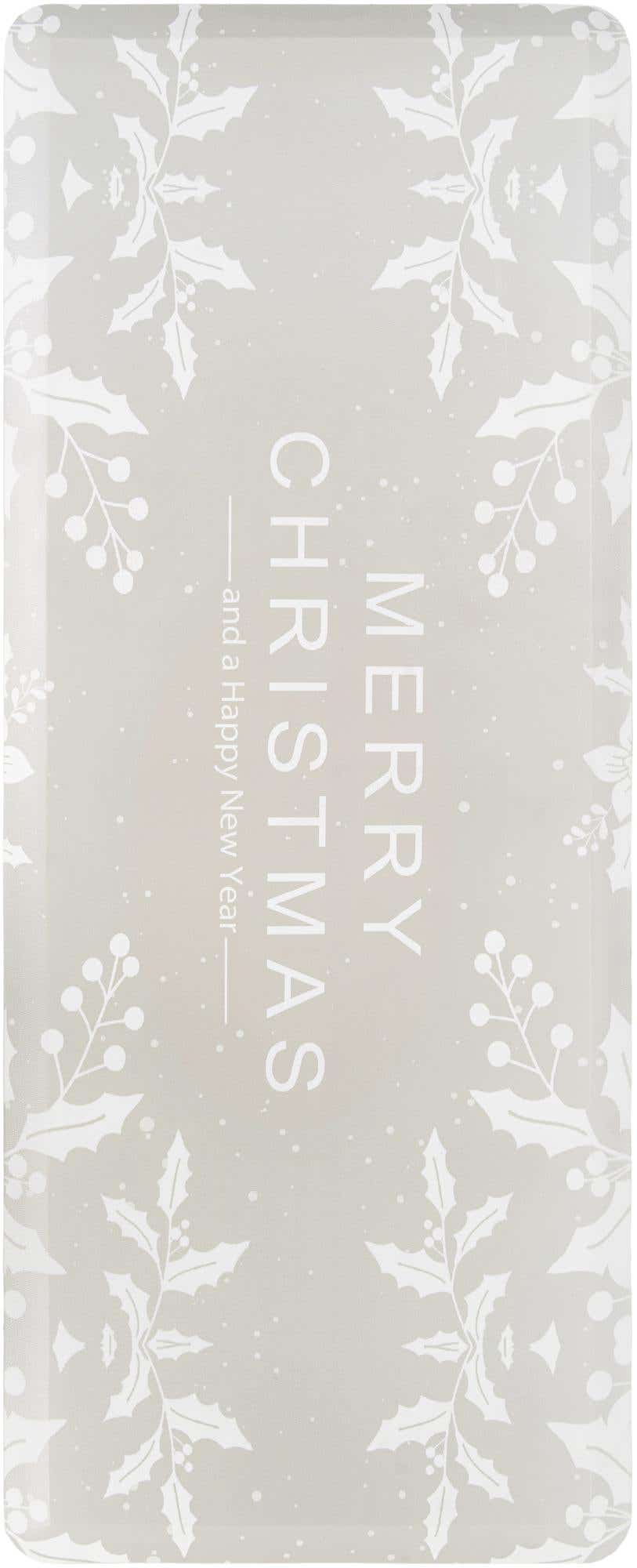 A rectangular gray Comfort Mat with white holly and berry patterns along the edges, and the text 'MERRY CHRISTMAS and a Happy New Year' in the center.