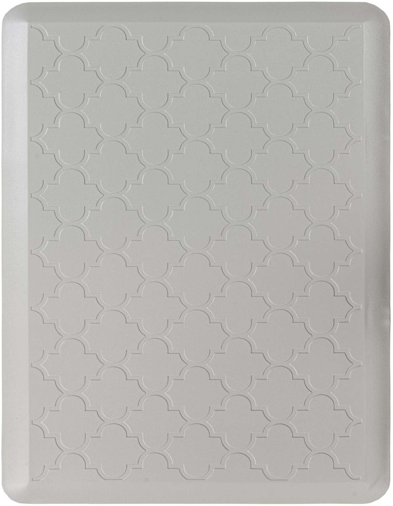 A rectangular gray Comfort Mat by Rugs.com with a repeating quatrefoil pattern, designed for indoor use.