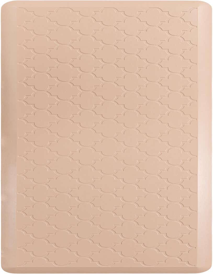 A 2x5 rectangular tan comfort mat with a subtle embossed quatrefoil pattern, ideal for kitchens or standing areas.