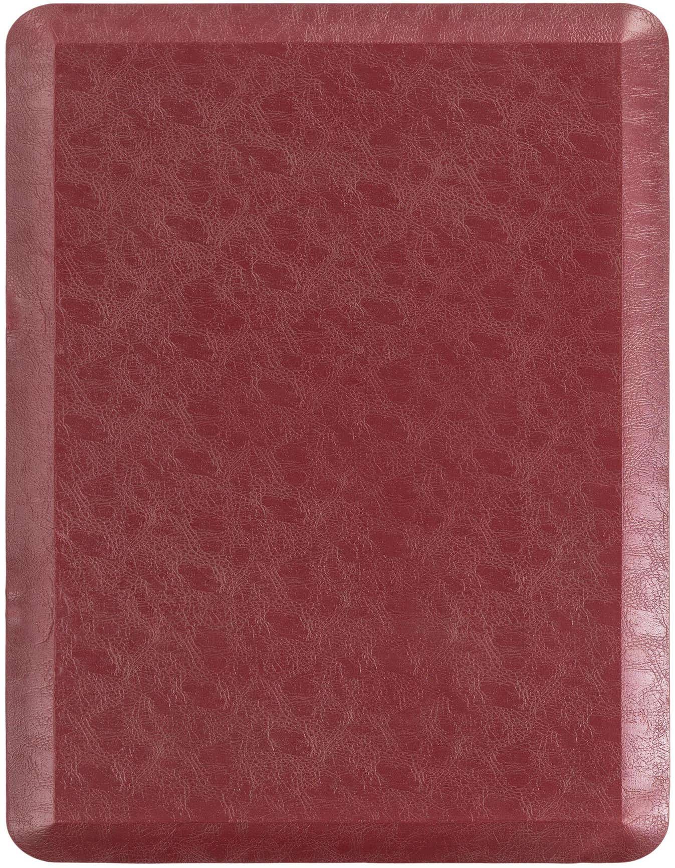 A 2x3 rectangular Comfort Mat from Rugs.com in a solid deep red color with a subtle textured surface, ideal for indoor use.