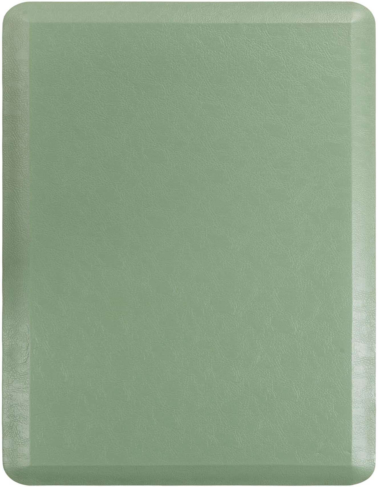 A rectangular 2x3 green Comfort Mat from Rugs.com, featuring a subtle textured surface and rounded edges, ideal for indoor use.