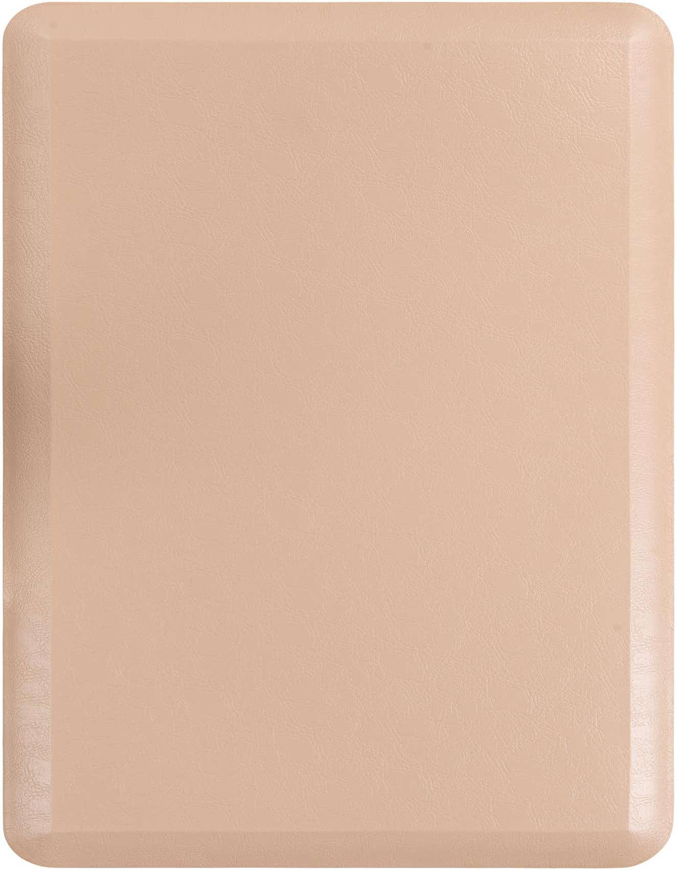 A rectangular 2x3 tan and brown comfort mat with a textured surface and rounded corners, suitable for indoor use.