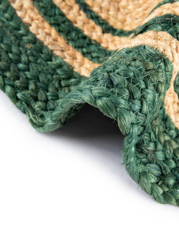 Detail image of  7' 1 x 7' 1  Hand Braided Christmas Tree Skirt
