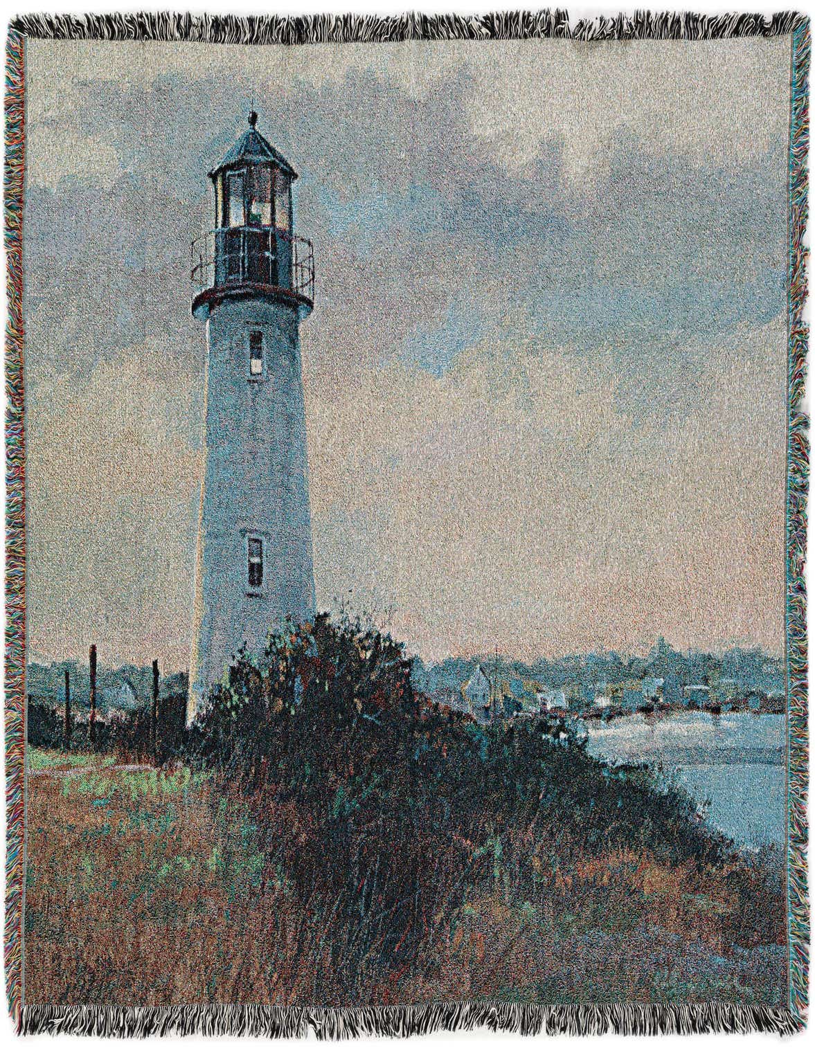 A rectangular 4x6 throw blanket featuring a modern art design of a white lighthouse on a grassy hill overlooking water, under a cloudy sky.
