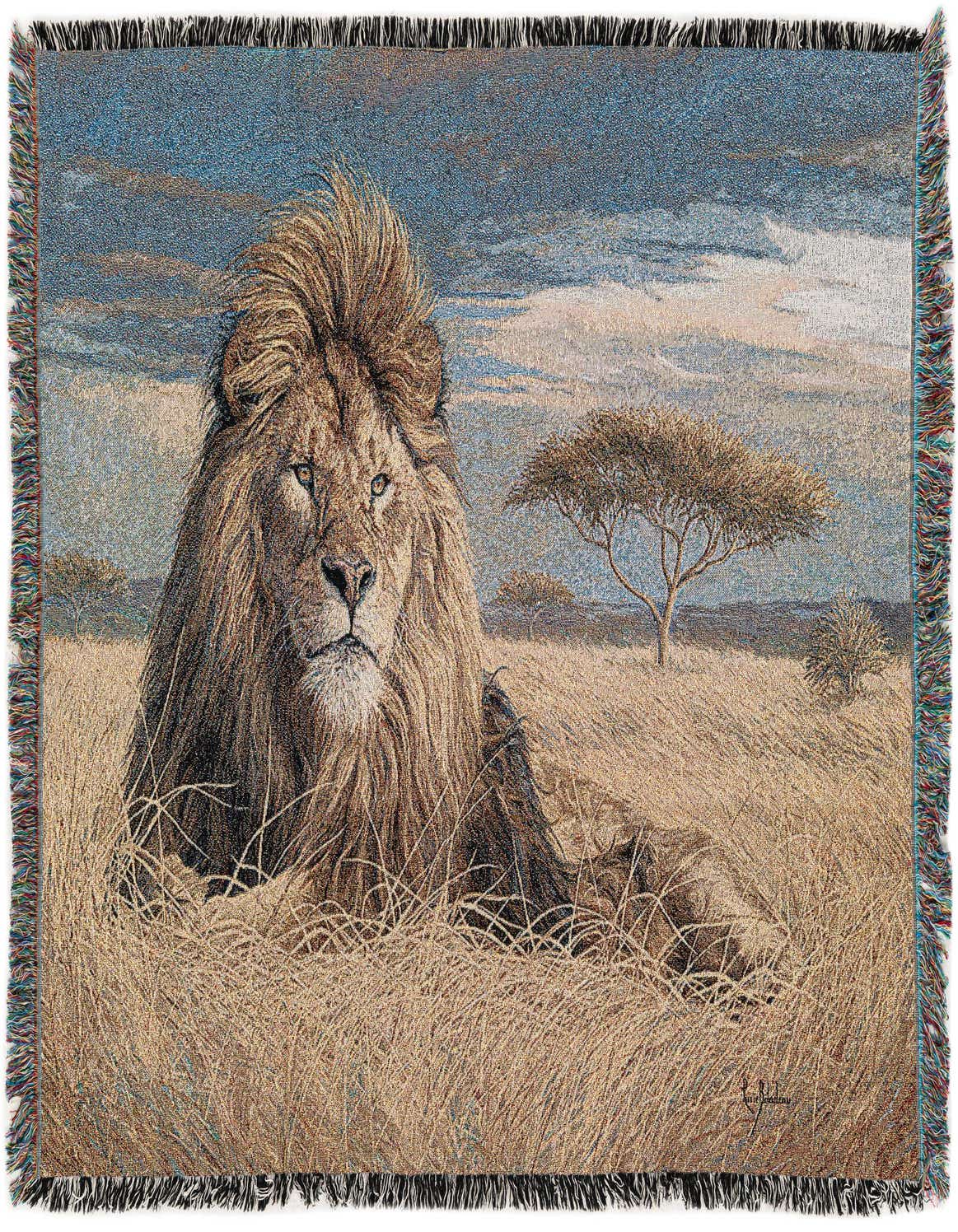 A rectangular 4x6 multi-colored cotton rug featuring a majestic lion in a savanna landscape under a cloudy sky, with fringed edges.