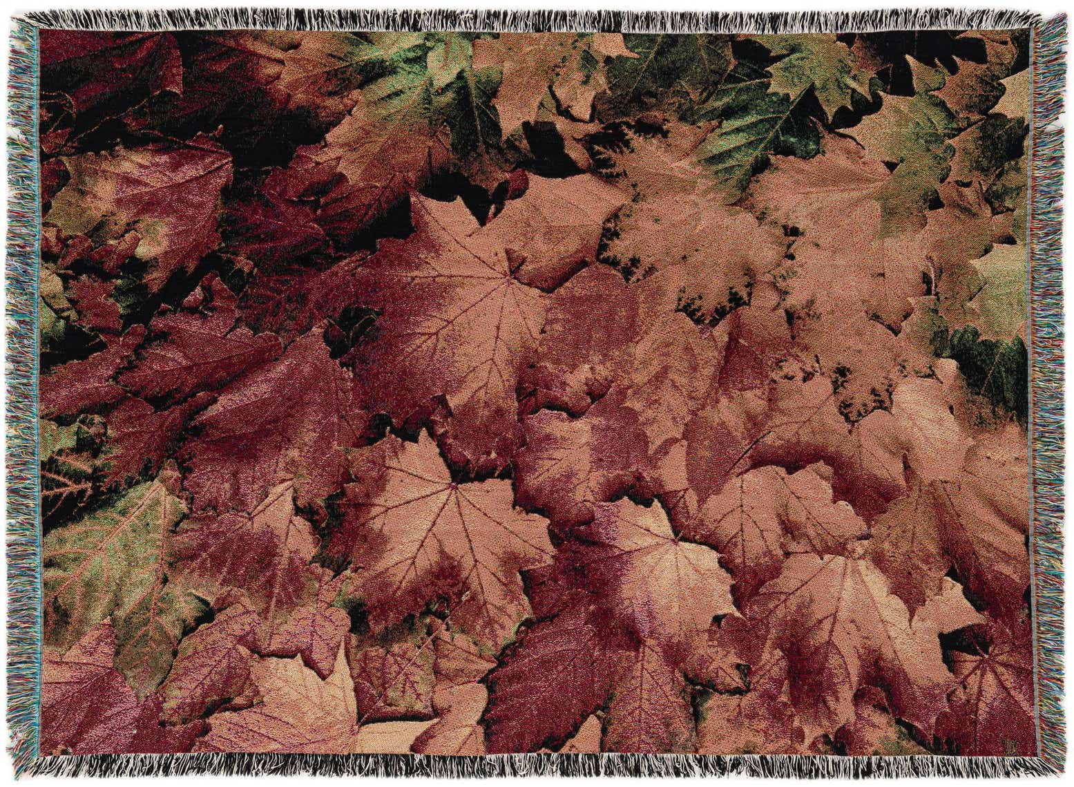 A 4x6 rectangular rug featuring a detailed modern floral pattern of autumn leaves in shades of orange, red, and hints of green, suitable for an indoor living space.
