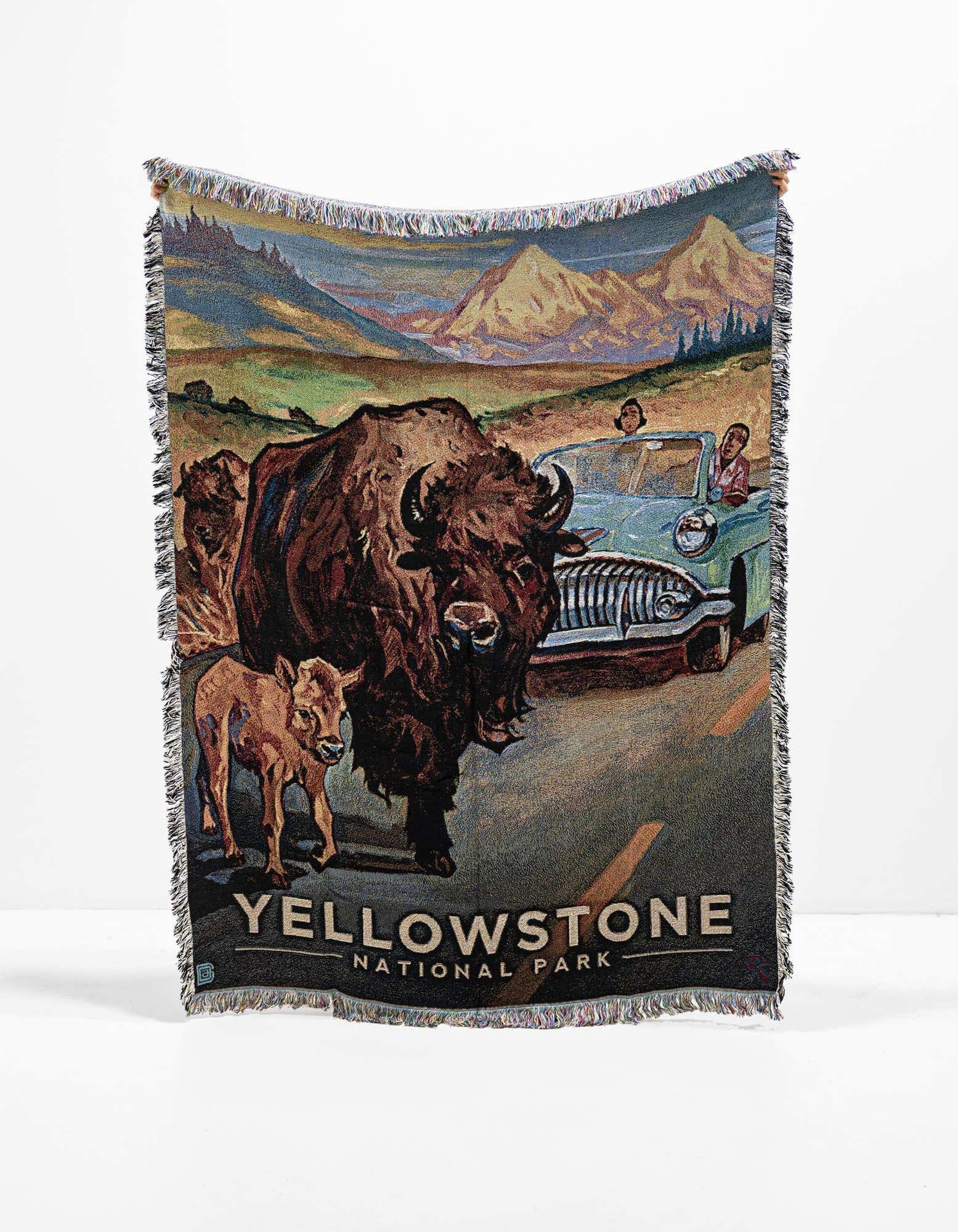 A multi-colored 4x6 rectangular throw blanket featuring a modern Yellowstone National Park design with bison and a vintage car.
