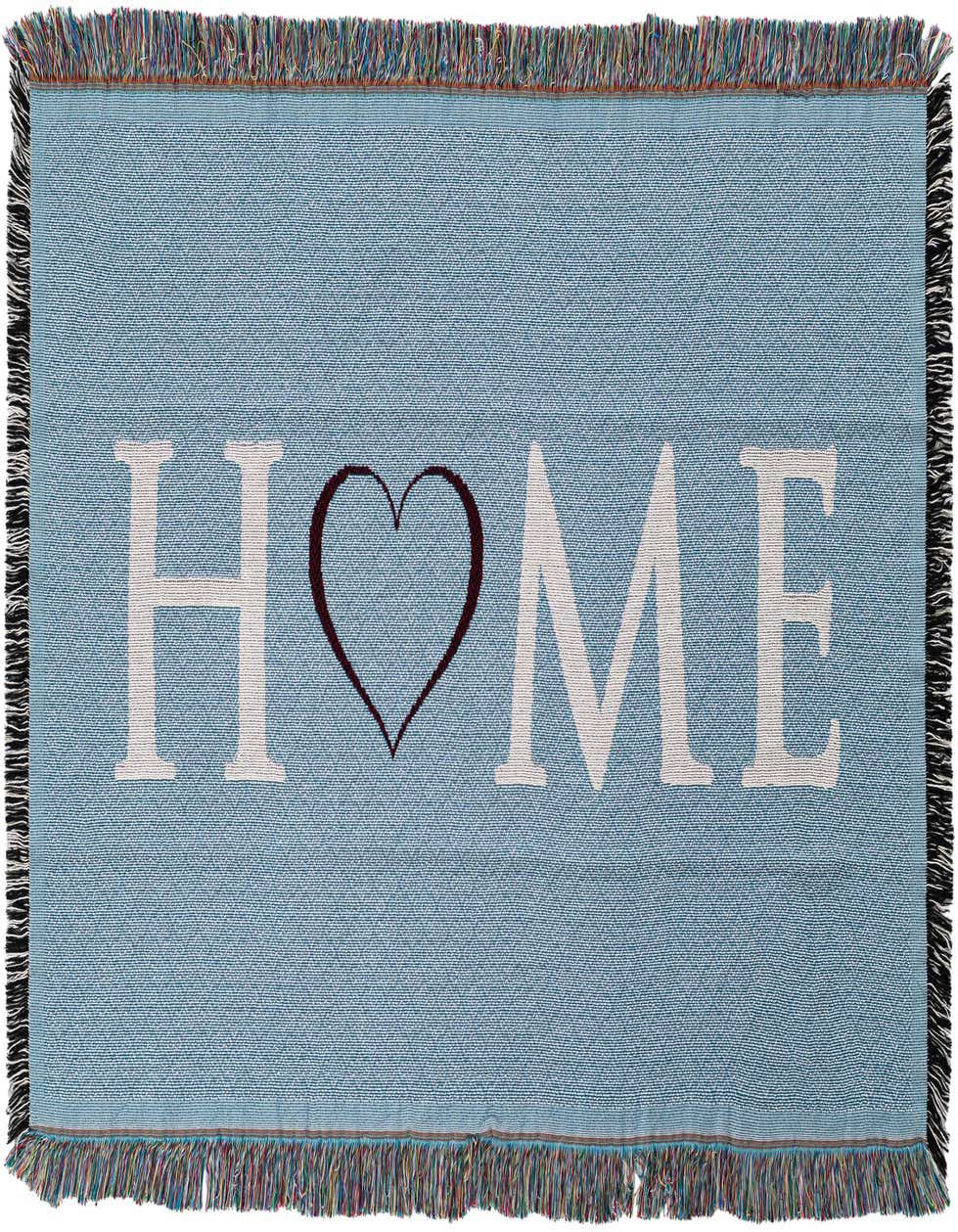A 4x6 rectangular blue cotton throw blanket with "HOME" in white letters, a red heart replacing the 'O', and multicolored fringe.