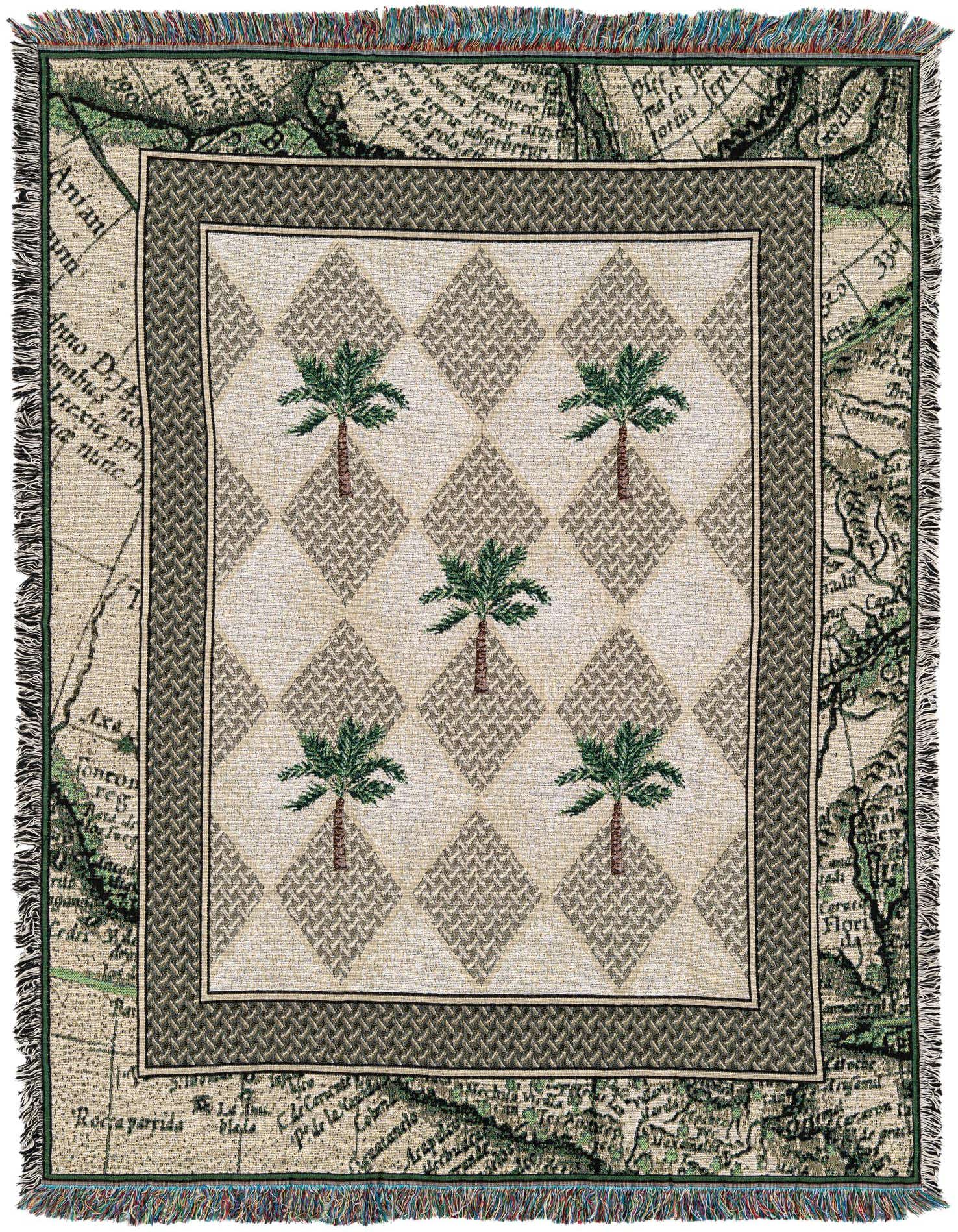 A multi-colored 4x6 rectangular cotton throw blanket featuring a central pattern of palm trees on a diamond lattice, bordered by an antique map design with fringe.