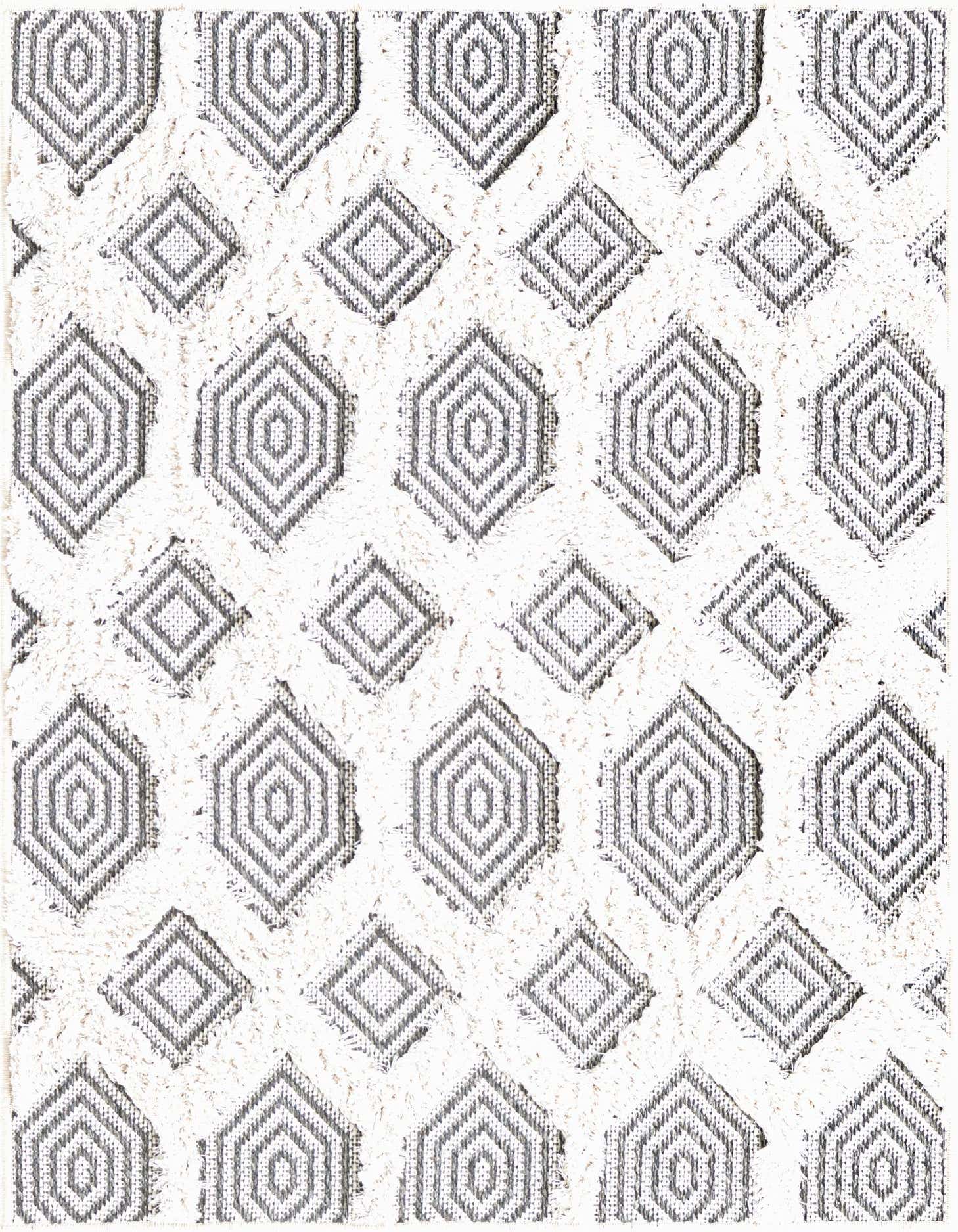 A 2x3 rectangular Rugs.com Sabrina Soto Casa rug featuring a modern abstract pattern of black and gray geometric shapes on a textured white background.