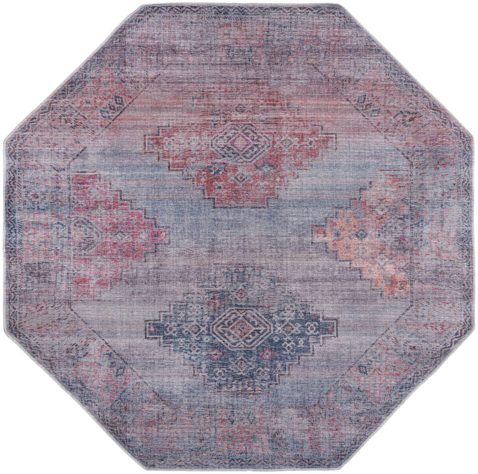 An 7' 10 x 7' 10 octagon rug in a distressed Southwestern and Traditional style, featuring blues, reds, and oranges in a vintage pattern.