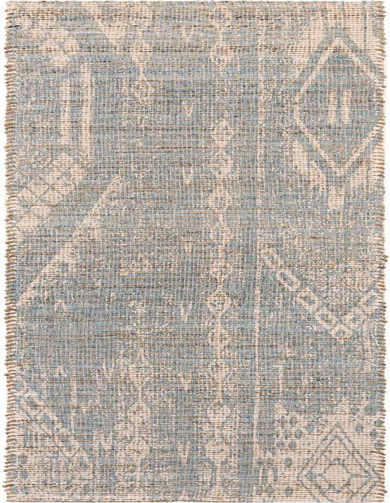 A handmade 8 ft runner rug featuring a flatweave Southwestern and abstract pattern in shades of blue and natural jute.