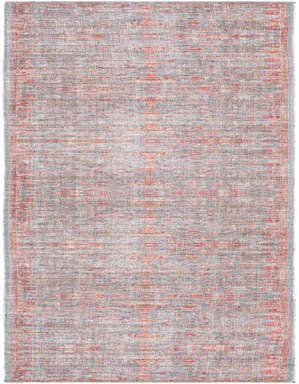 A 10 ft runner rug from the Nostalgia Collection, featuring a faded blue, red, and orange traditional floral and tribal pattern, ideal for a hallway.