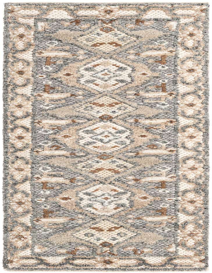A 6 ft runner rug featuring an antique gray background with modern floral patterns in cream, beige, and brown, showcasing its textured wool pile.
