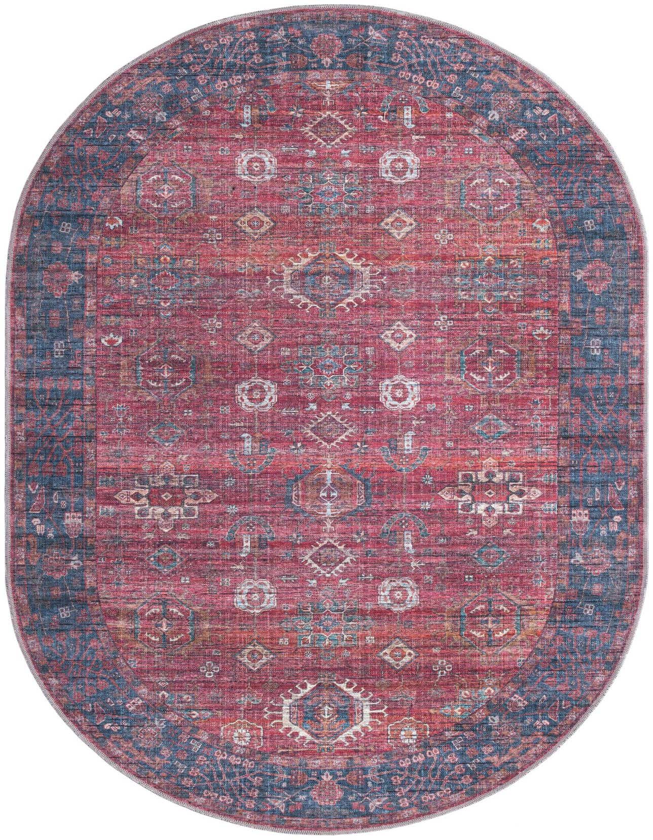 A 5'3" x 8'0" oval Maahru rug featuring a distressed traditional tribal pattern in various shades of red and blue.