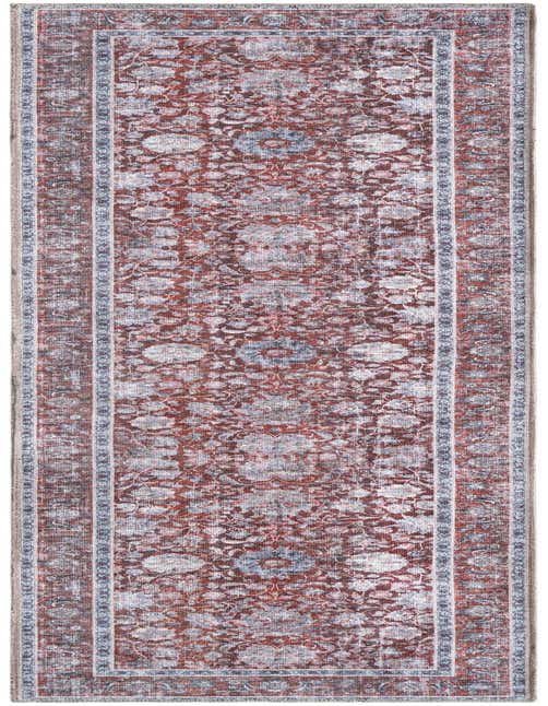 A long 8 ft runner rug in shades of red and grey, featuring a distressed traditional floral pattern with a decorative border.