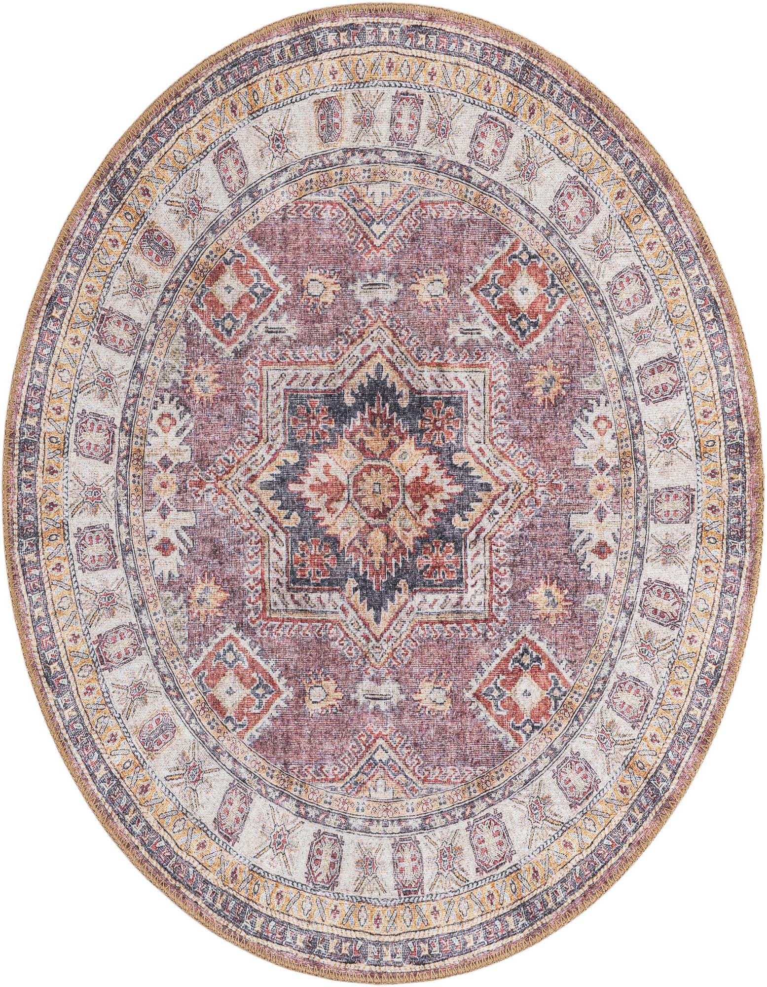 A 3' 6 round Antique Rose Pink rug with a distressed medallion pattern, featuring hints of blue, orange, and yellow.