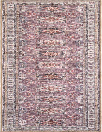A 12 ft runner rug in antique rose pink with a distressed traditional pattern, ideal for a hallway.