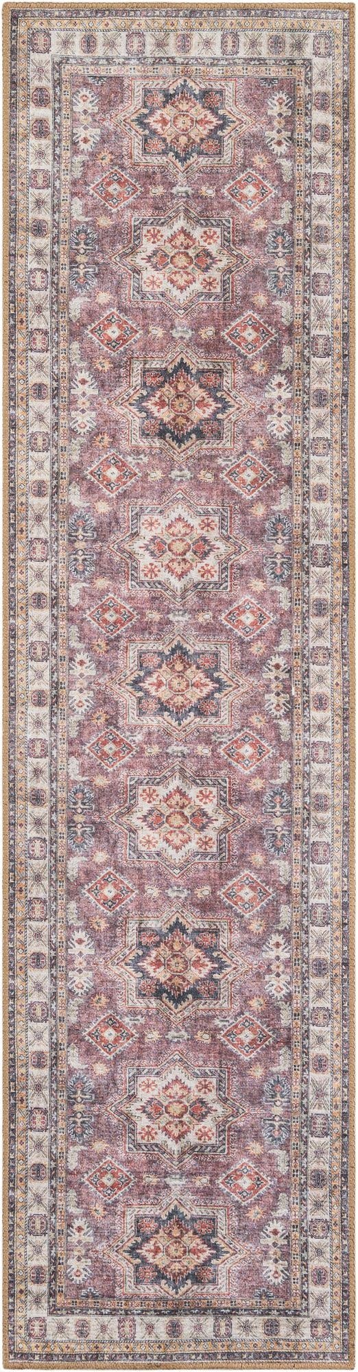 An 8 ft runner rug in antique rose pink with a distressed geometric pattern, ideal for hallways or patios.
