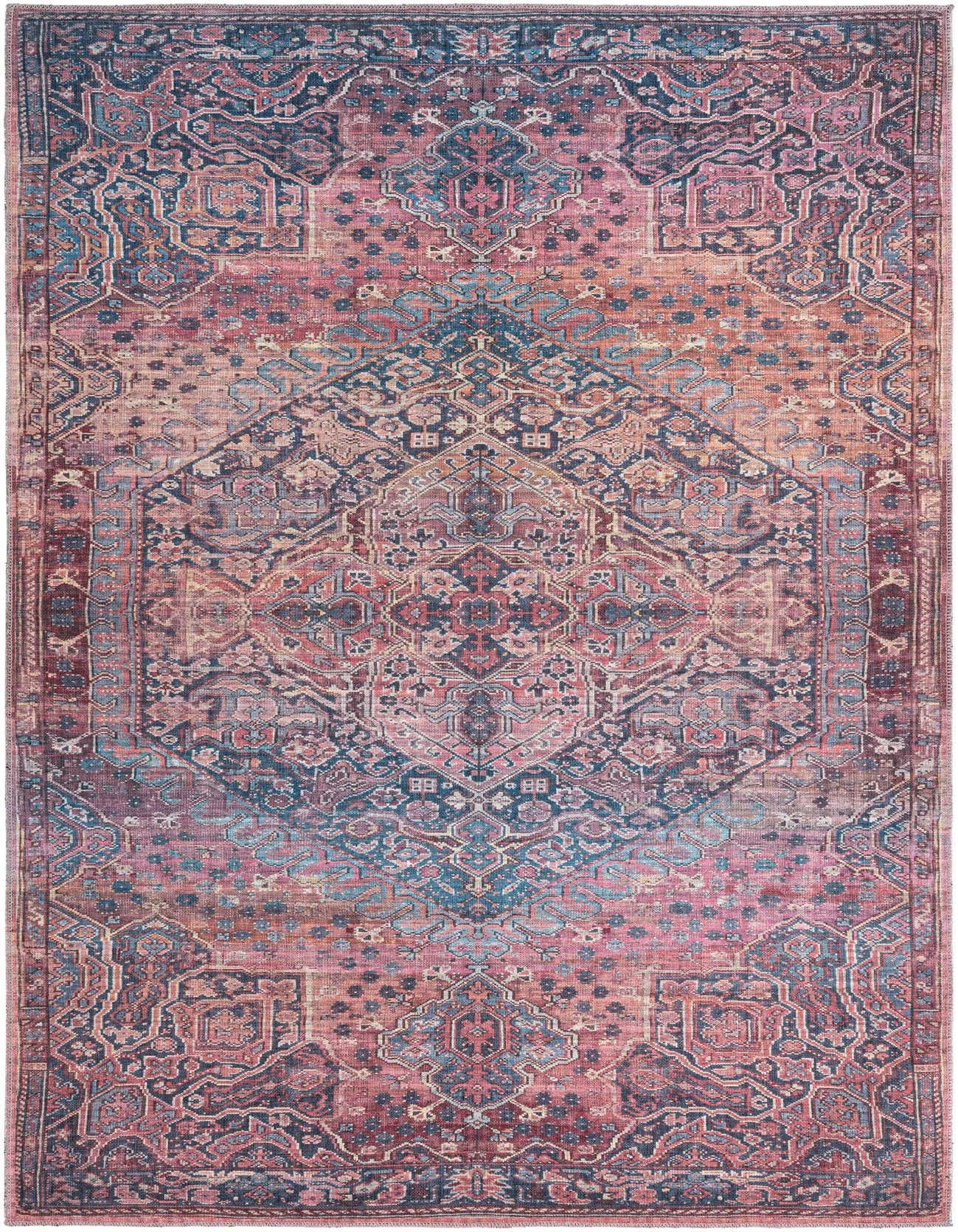 A 6x9 rectangular Maahru rug in traditional vintage floral pattern with distressed reds, pinks, and blues.