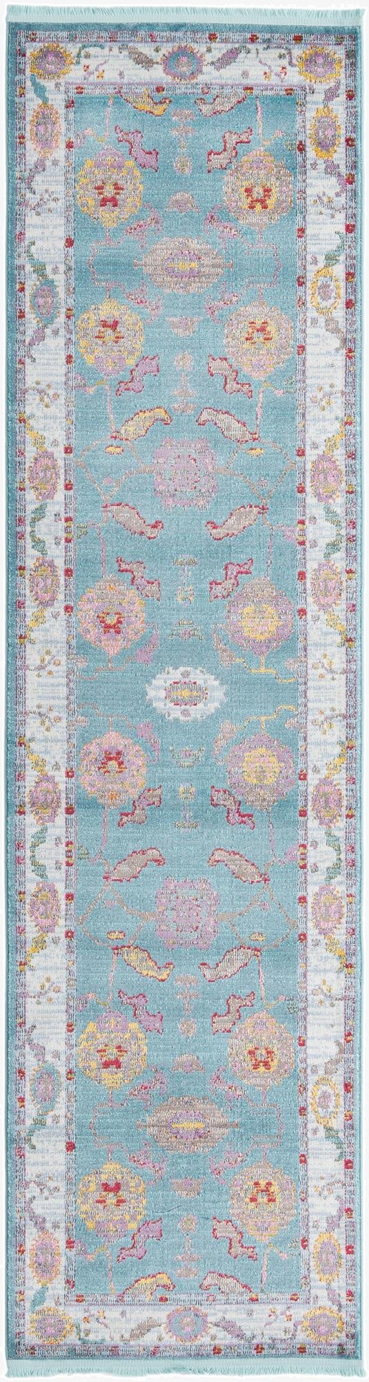 A 10 ft runner rug in shades of blue with a traditional vintage medallion pattern in pink, yellow, and white.