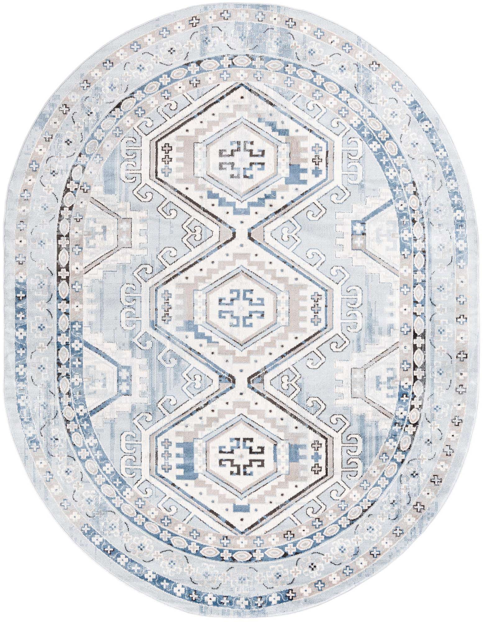 An oval 7'10 x 10'0 Charlotte rug featuring a tribal and traditional pattern in various shades of blue, grey, and white.